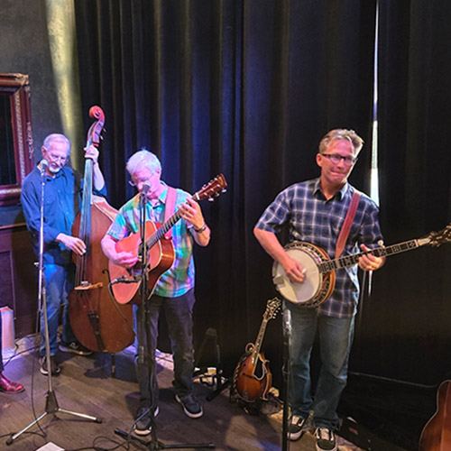 Photograph of Mullins, Carins, and Lee performing live at Cutler's Public House in Santa Barbara, CA